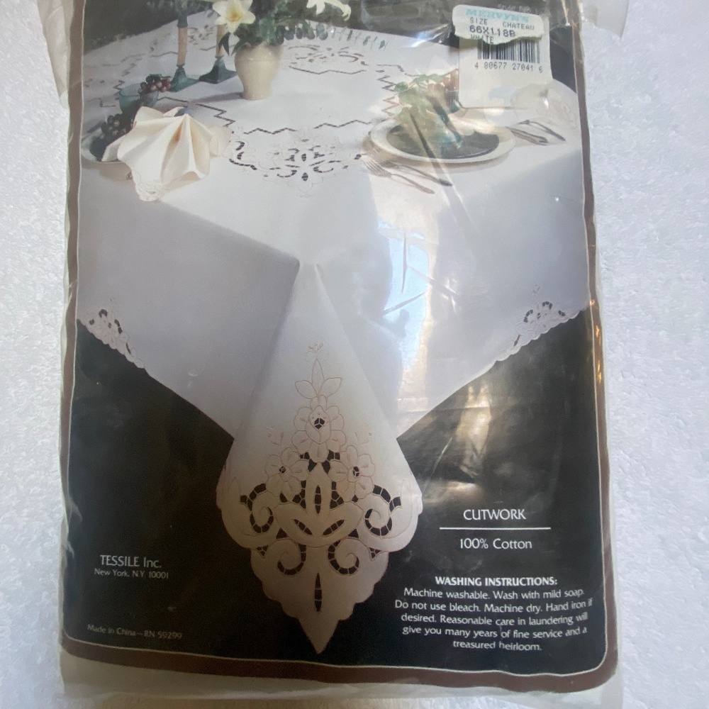 Chateau Cutwork White Tablecloth. 66 x118 Oblong